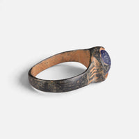 Byzantine bronze ring 'Kallinike' shows its setting edge and the inside of the broad hoop from the side.