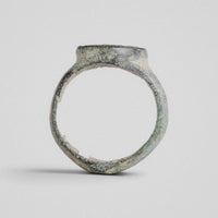 Byzantine bronze ring Kalothea, profile view showing tapering hoop and raised bezel
