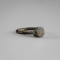 Byzantine bronze ring Kyriakos three-quarter view showing raised bezel and patinated hoop