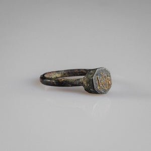Byzantine bronze ring Kyriakos three-quarter view showing raised bezel and patinated hoop