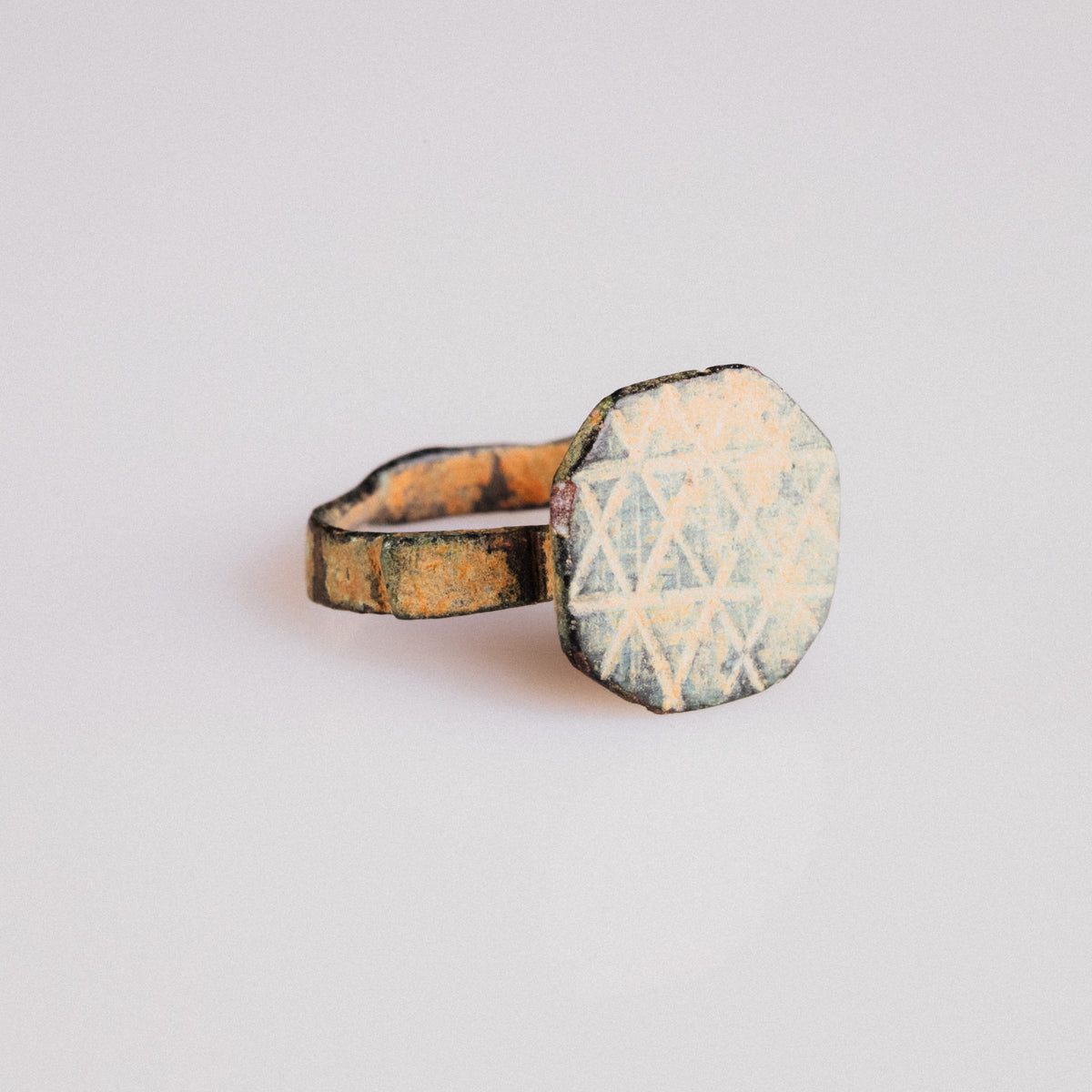 Byzantine bronze ring Theoktistos front view with crosshatched Seal of Solomon motif