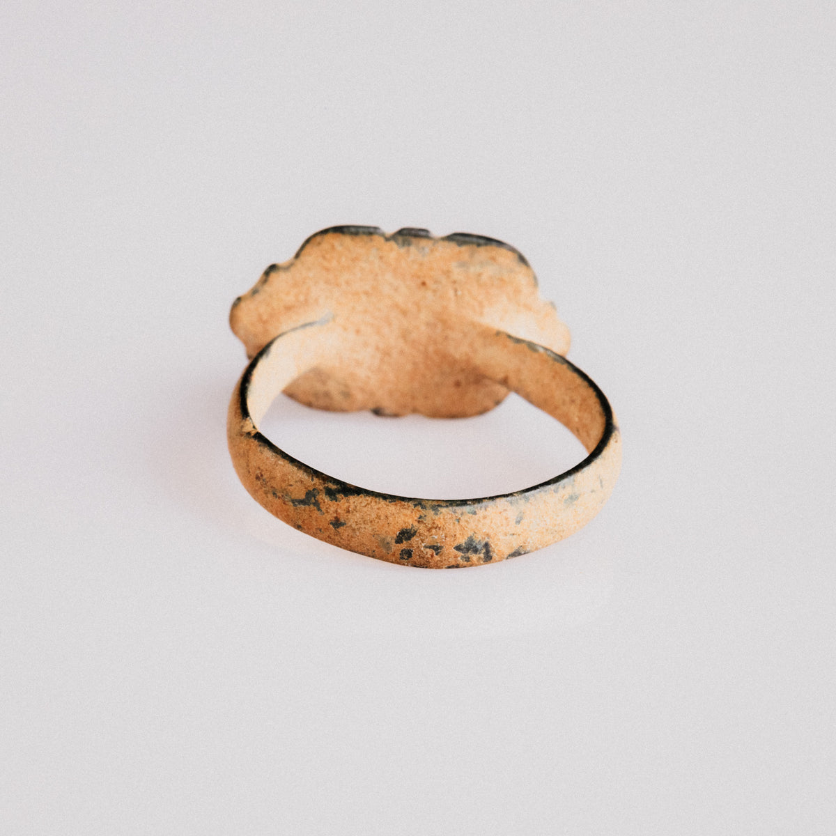 Byzantine bronze ring Theoxena rear view with earthy calcareous burial patina on hoop