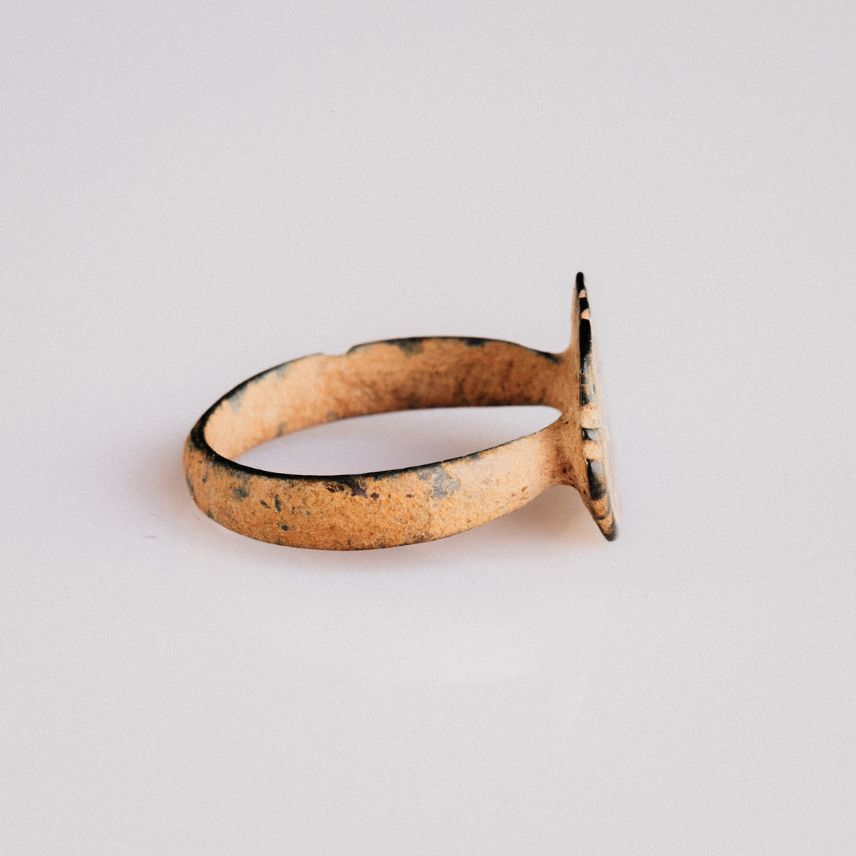 Byzantine bronze ring Theoxena side profile revealing integral cast hoop and patina