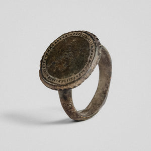 Byzantine bronze ring Xenaros showing hatched double border and worn central field