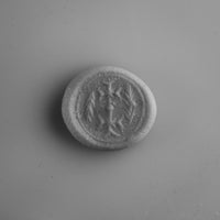 Byzantine silver ring Klados, putty impression showing the intaglio device and border raised.