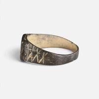 Byzantine bronze ring 'Ioanna' shows its engraved shoulder and hoop from the opposite side.