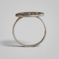 Byzantine silver ring Klados, profile view showing flat disc bezel and hoop thickness.