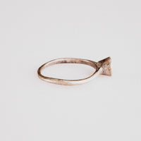 Byzantine silver ring Iesous profile view highlighting hand-formed hoop and patina