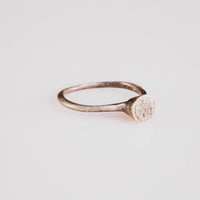 Byzantine silver ring Iesous side view showing wire hoop and raised disc bezel