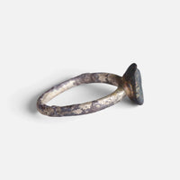 Byzantine ring 'Theodosia' shows its raised bezel edge and narrow band from the side.