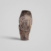 Silver band ring 'Ovata' shows its concentric oval engraving and worn shoulders from the front.