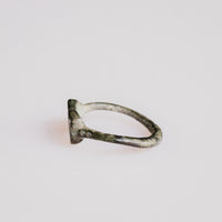 Detail of Roman bronze ring Numerius highlighting hoop taper and green patina
