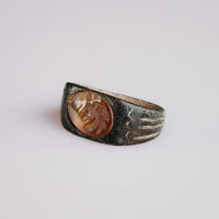 Detail of Roman bronze ring Palmata carnelian intaglio with palm frond motif