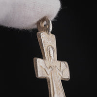 Detail of suspension loop and upper arm of Peristeria Byzantine silver cross pendant