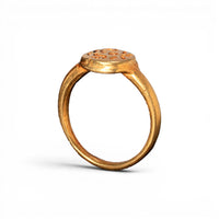 Early medieval gold ring standing upright