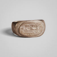 Front view of Roman silver ring Solaris with raised oval bezel centered