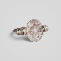Roman silver ring Veneria viewed from above, showing the intaglio surface of the plate