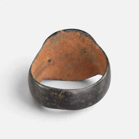 Byzantine bronze ring 'Kallisto' shows the plain back of its broad bezel and the inner hoop.
