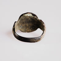 Interior view of medieval bronze ring Aldwyn showing D-section hoop and mineral accretions