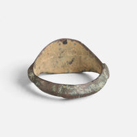 Medieval bronze ring 'Radwin' shows its broad inner shoulders and the back of the bezel.
