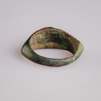 Interior view of Roman bronze ring Corvinus with earth-encrusted greenish patina