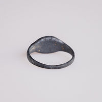 Interior view of Roman bronze ring Formica showing hoop taper and cast construction