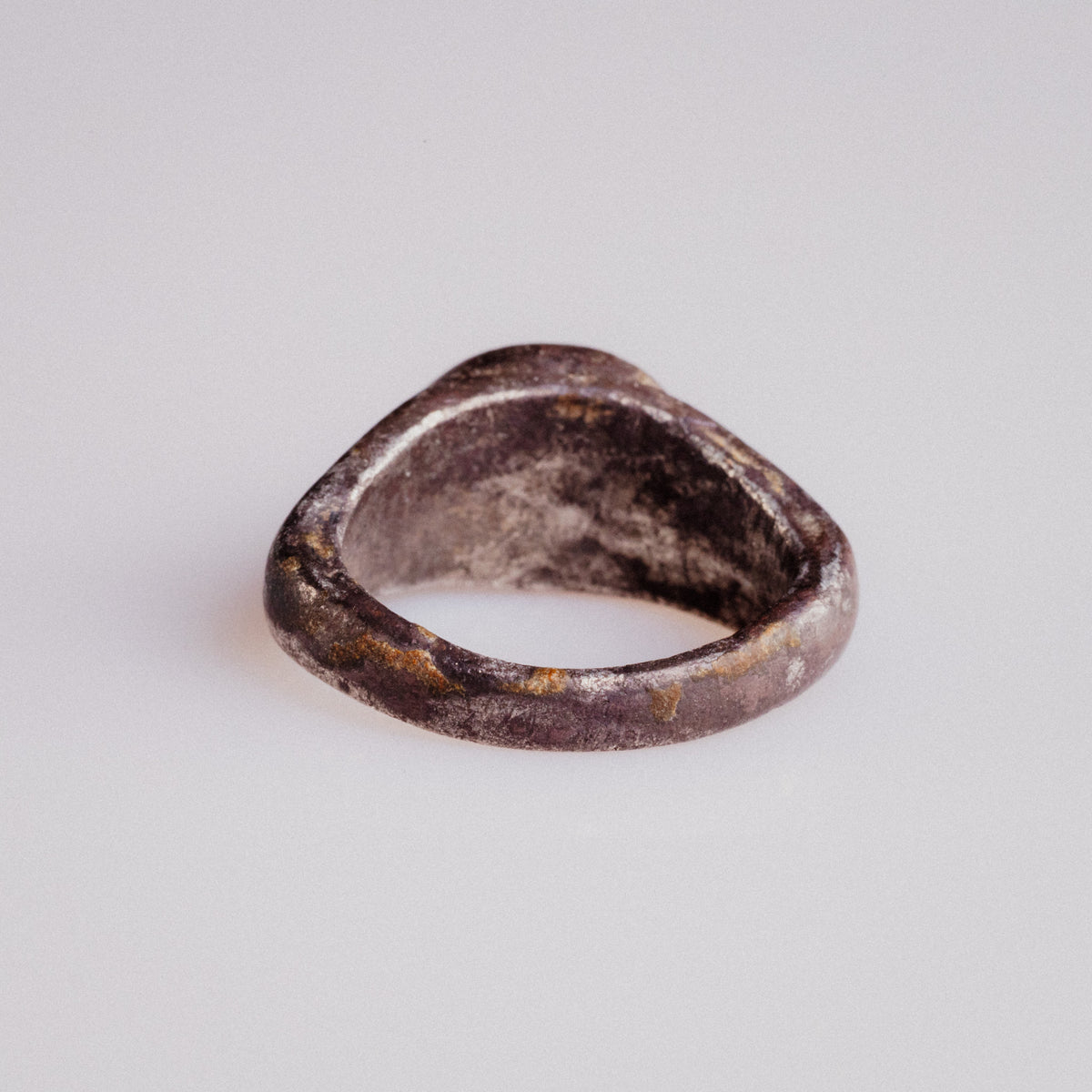 Interior view of Roman silver ring Pisculus showing hoop profile and wear