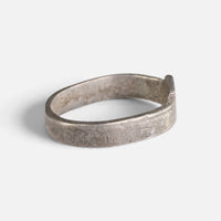 Roman silver ring 'Sextus' shows the broad flat band and bezel edge from the side.