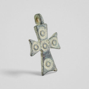 Byzantine bronze cross pendant 'Okellos' angled view showing cast suspension loop and relief bosses