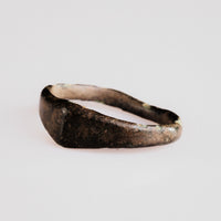 Medieval bronze ring Alderic angled view showing untouched surface texture