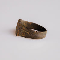 Medieval bronze ring Aldric, opposite side showing chevron shoulder decoration