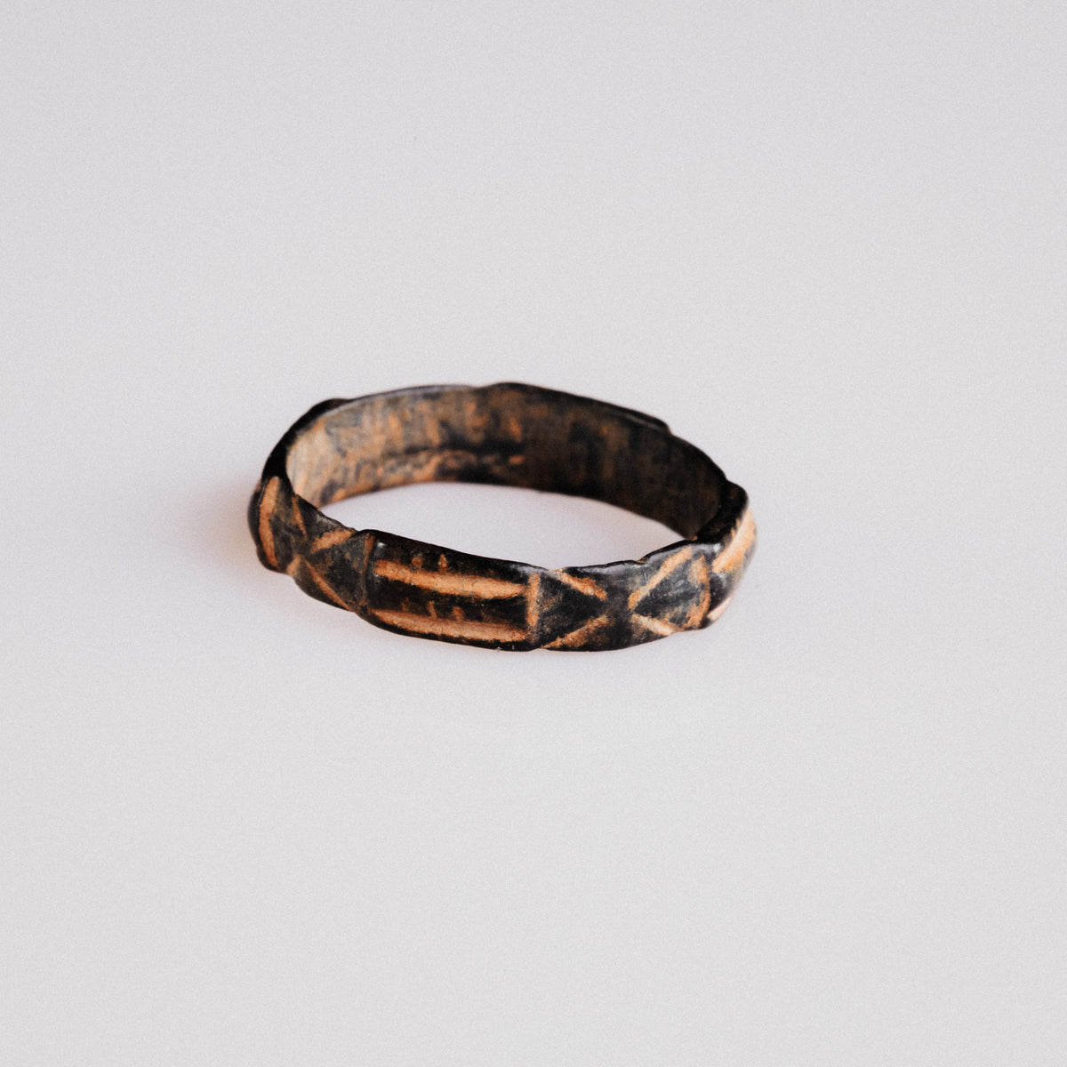 Medieval bronze ring Aldric with alternating saltire crosses and hatched panels around the hoop