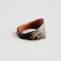 Medieval bronze ring Drudan angled view revealing reddish cuprite interior
