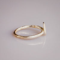 Medieval bronze ring Florentia side profile showing twisted-wire cable band construction