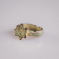 Medieval bronze ring Florian three-quarter view highlighting the raised floral motif