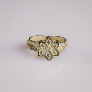 Medieval bronze ring Florian with six-lobed rosette bezel viewed from above