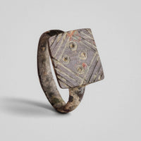Medieval bronze ring Radvan with lozenge bezel and four ring-and-dot bosses in raised view