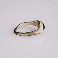 Medieval bronze ring Vespertin side profile revealing green malachite patina and hoop taper
