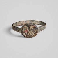 Medieval bronze ring Vetrik, angled view highlighting green-grey patina on the hoop