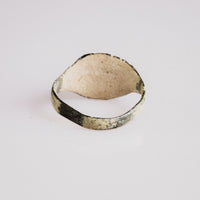 Medieval bronze ring Vitalya rear view showing hoop interior and calcareous encrustation