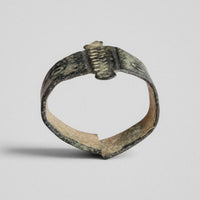 Medieval bronze ring Wistanoc, profile view showing open back and overlapping ends