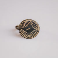Medieval bronze signet ring Aldric with engraved four-pointed star and hatched quadrants on disc bezel