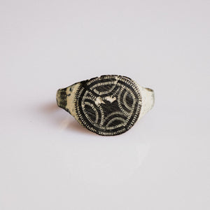 Medieval bronze signet ring Vitalya with engraved quatrefoil and interlace bezel, top view
