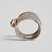 Medieval silver ring Ilmar, profile view of hoop stack and helical wire binding