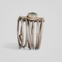 Medieval silver ring Ilmar showing six parallel notched hoops and beaded collet, front view