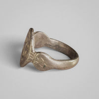 Medieval silver ring Wistrid, side view with almond-shaped shoulder pad and incised strokes