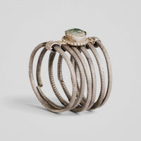 Medieval silver six-hoop ring Ilmar with green cabochon bezel, three-quarter view