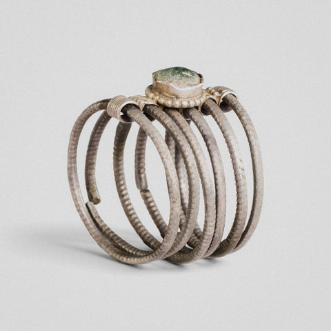 Medieval silver six-hoop ring Ilmar with green cabochon bezel, three-quarter view