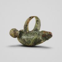 Opposite side of Roman bronze phallic pendant 'Felix' with green and red patina
