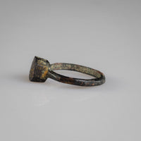 Opposite side view of Byzantine bronze ring Kyriakos showing shoulder flare and patina